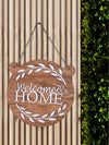 Welcome To Our Home Round with Ear Wooden Wall Hanging